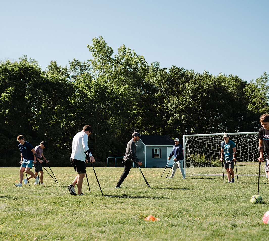 Adaptive athletes playing soccer