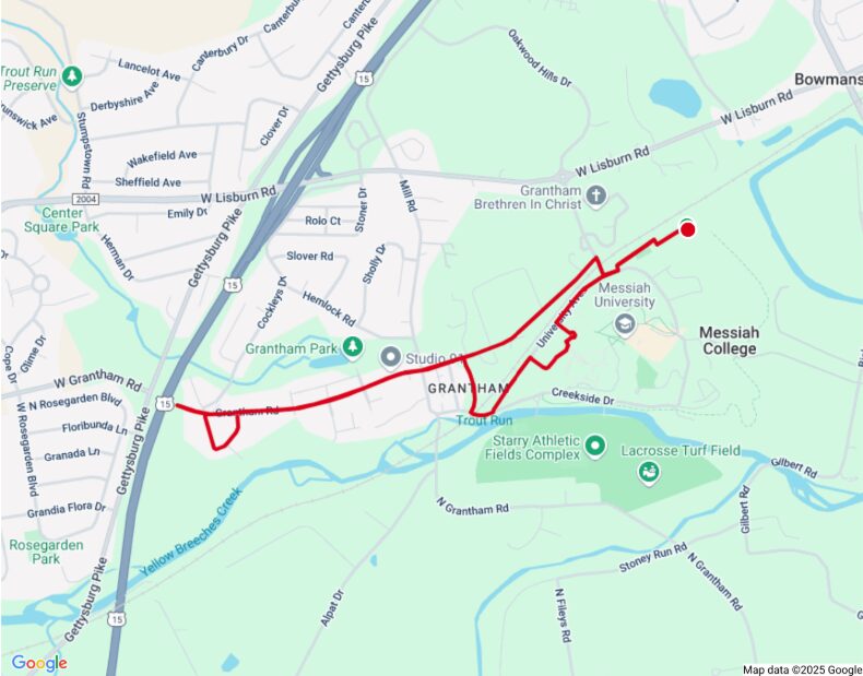 A map showing the race route for a 5K event through Grantham, Pennsylvania. The red line starts near Messiah College, winds through the campus and Grantham neighborhood, and loops westward along W Grantham Road and U.S. Route 15 before returning.