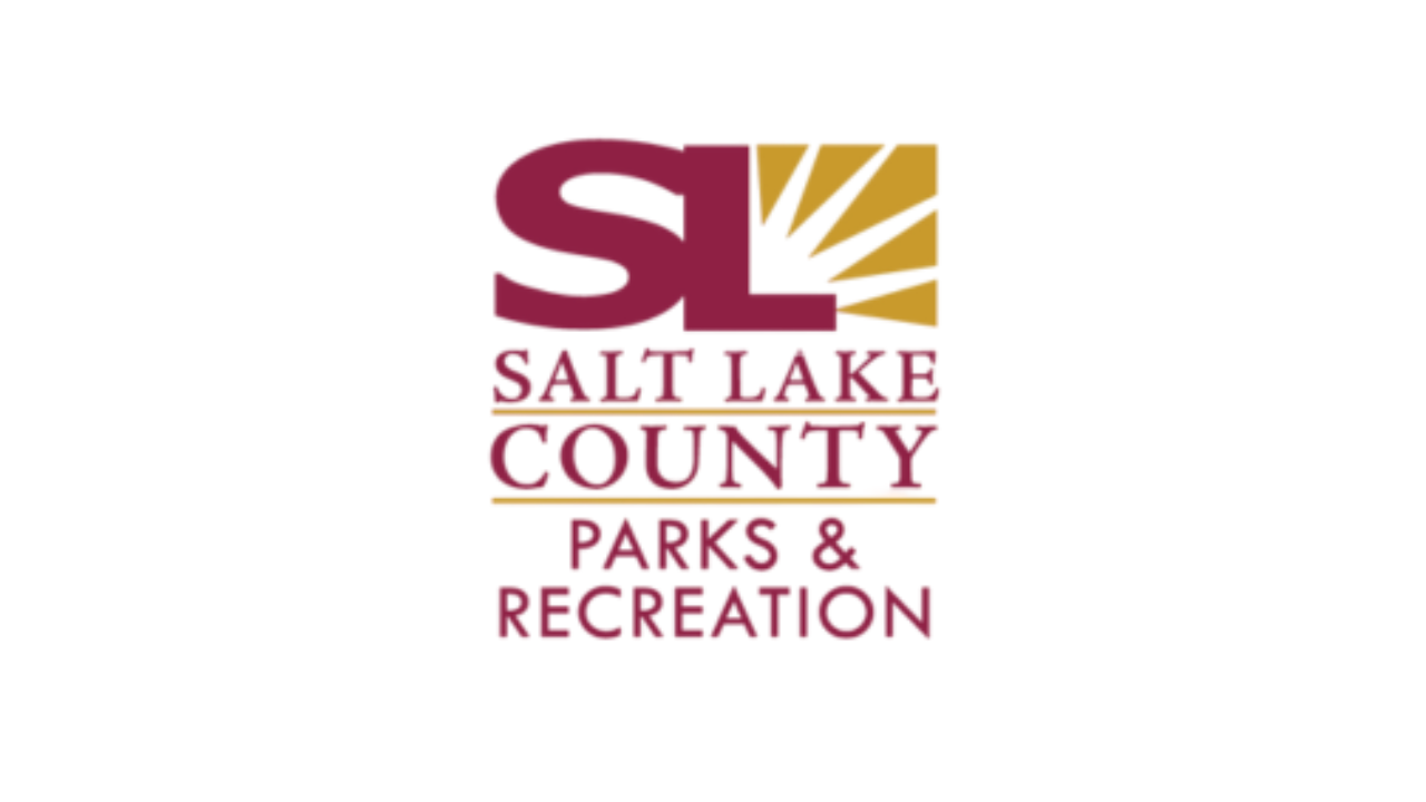 Logo for Salt Lake County Parks & Recreation featuring a bold maroon “SL” with golden rays extending from the top right, and the organization name in maroon and gold text below.